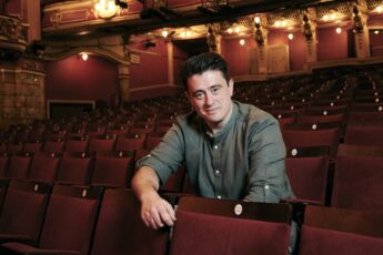 Brian Gilligan in a theatre
