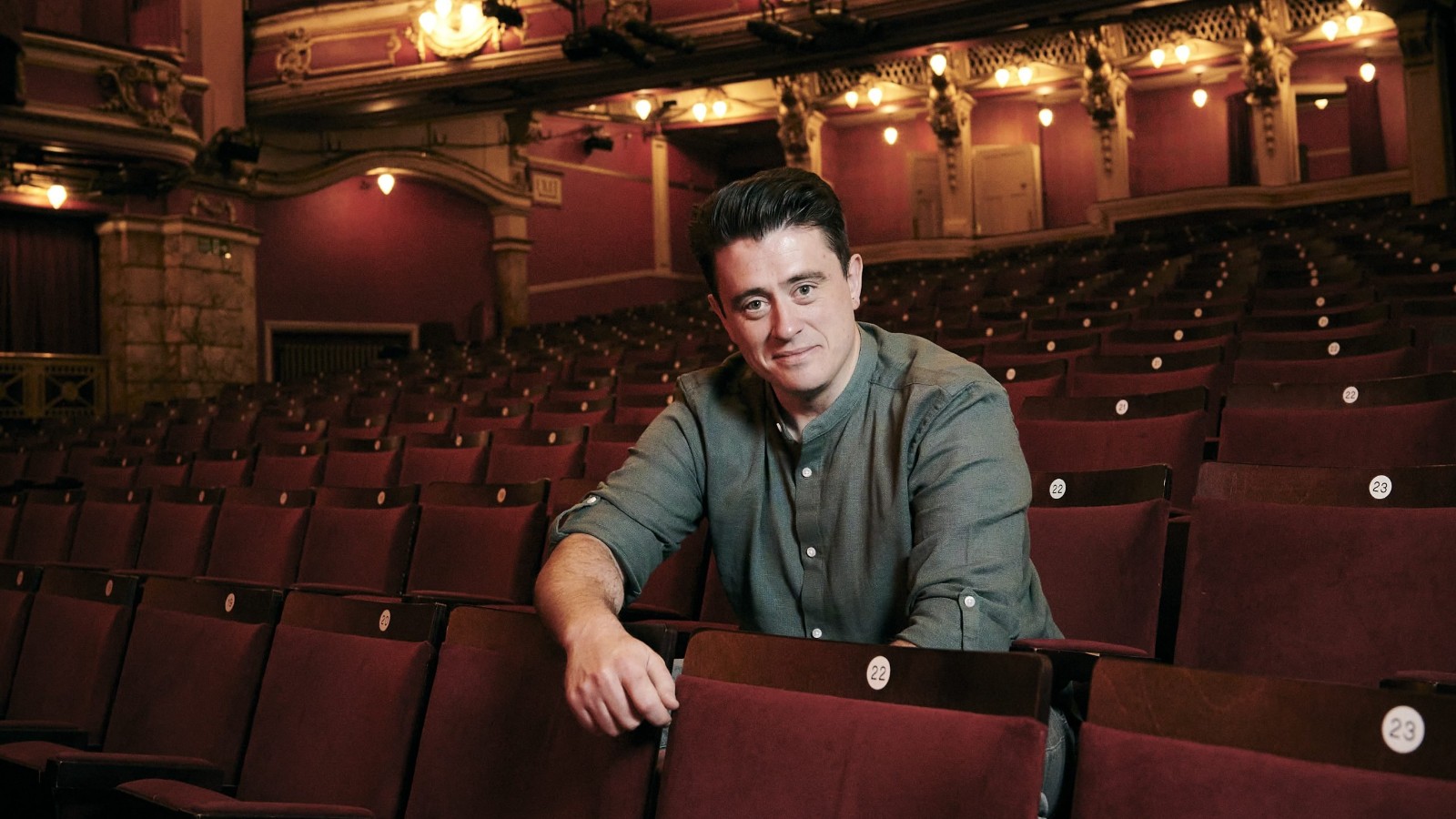 Brian Gilligan in a theatre